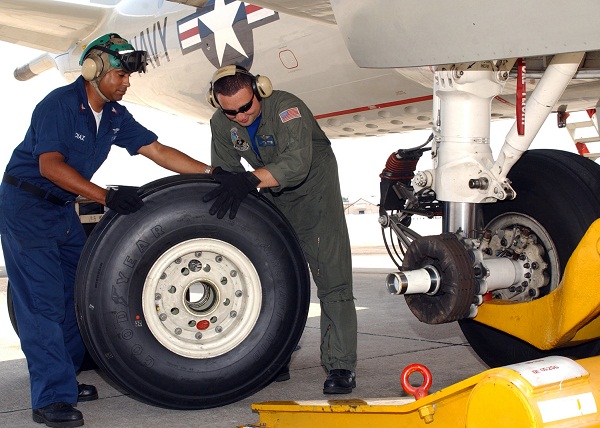  Changing a tire on a P-3C Orion aircraft. 